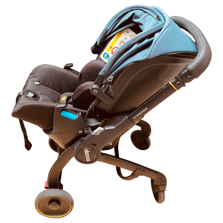 Doona-X-Car-Seat-&-Stroller-Greenish-Blue-1-3