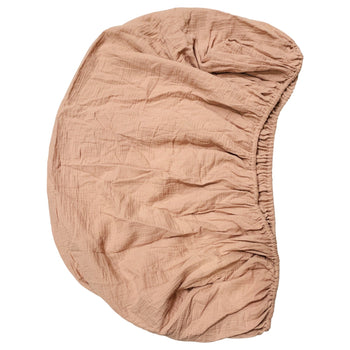 Mushie-Extra-Soft-Muslin-Crib-Sheet-in-Blush-1-2