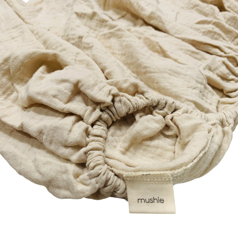 Mushie-Extra-Soft-Muslin-Crib-Sheet-in-Natural-1-3