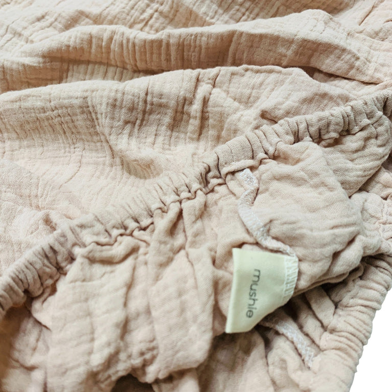 Mushie-Extra-Soft-Muslin-Crib-Sheet-in-Fog-1-3