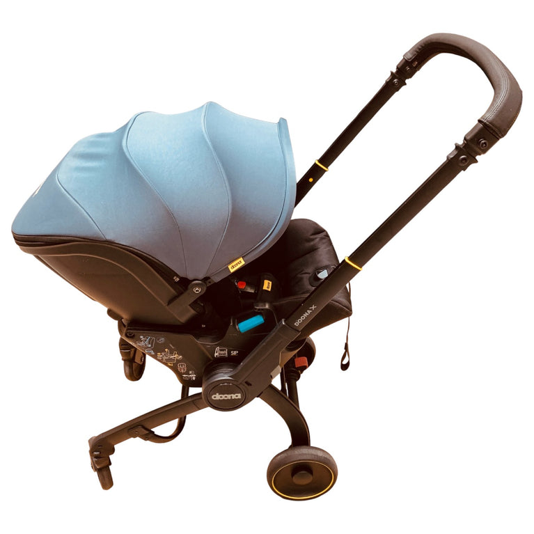 Doona-X-Car-Seat-&-Stroller-Greenish-Blue-1-4