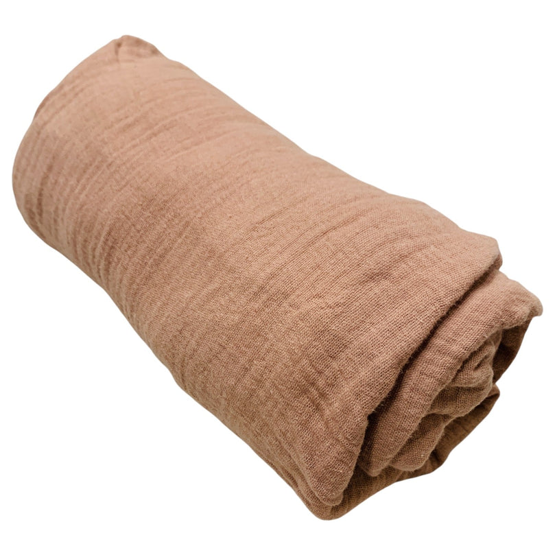 Mushie-Extra-Soft-Muslin-Crib-Sheet-in-Blush-1-4