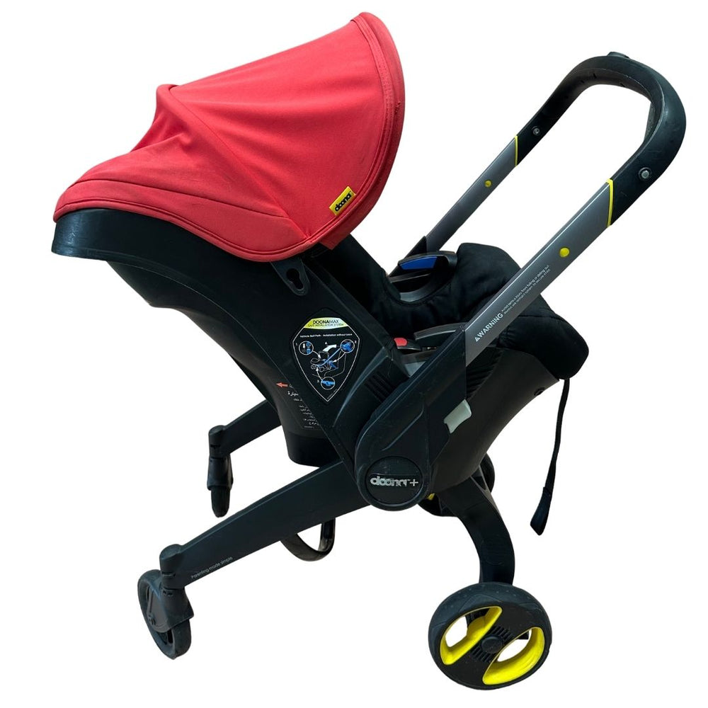 doona stroller uae Doona Stroller - Flame Red with Footmuff, Newborn Insert & Snap On Storage | Shop used Strollers in UAE